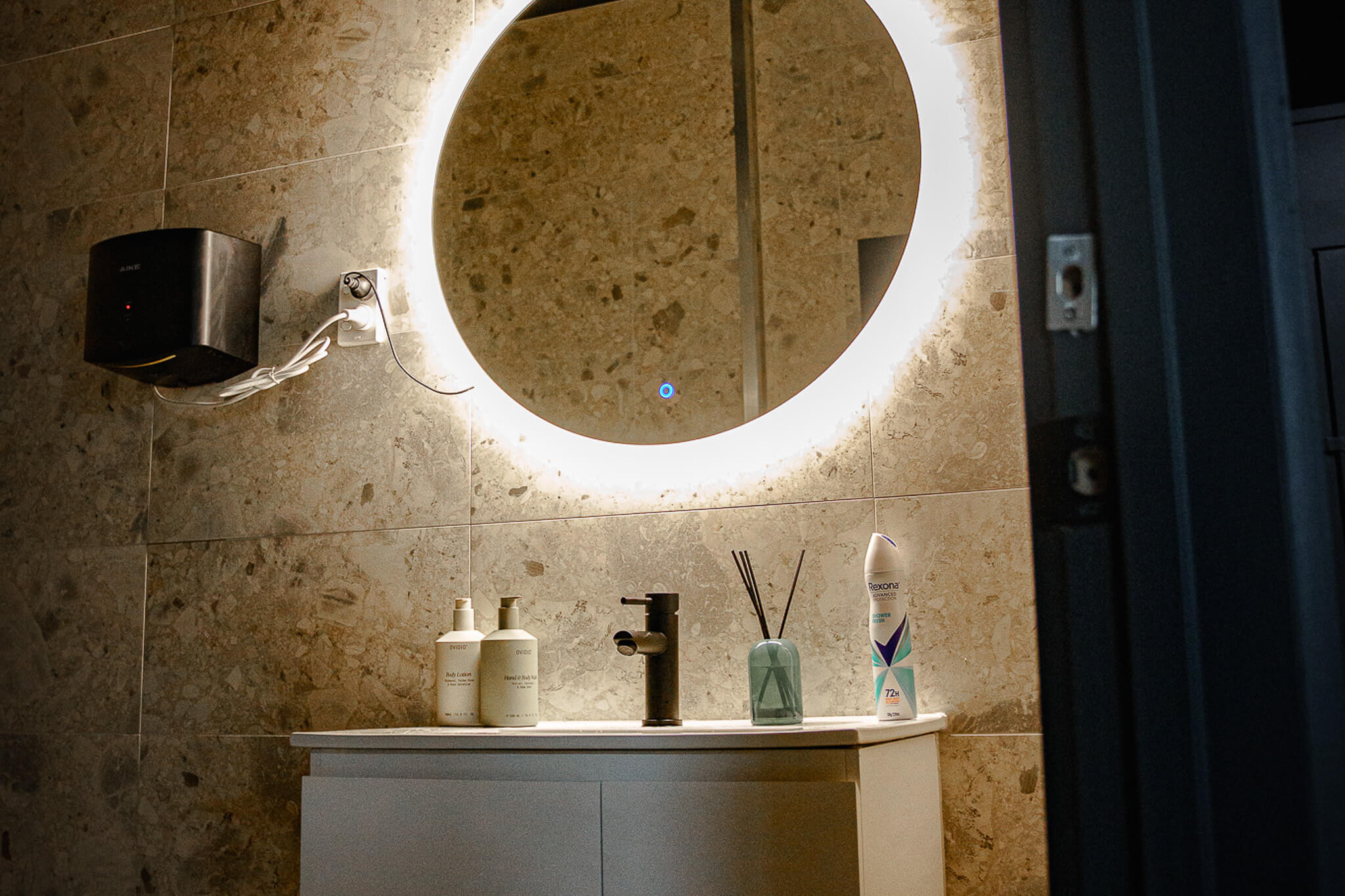 Change room vanity with backlit mirror at Reps Fitness Bayswater